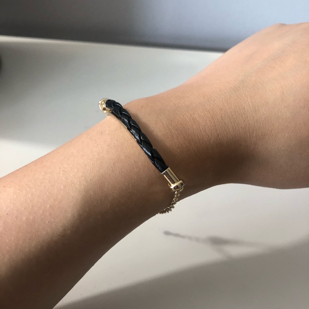 Cool black leather and gold tone bracelet